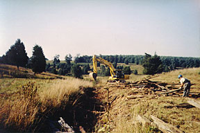 Removing nonhazardous debris from trench