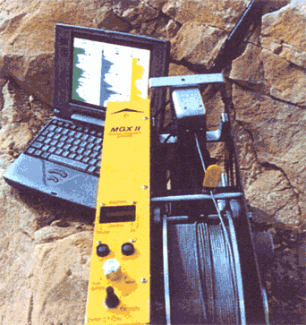 logging winch, cable, and laptop